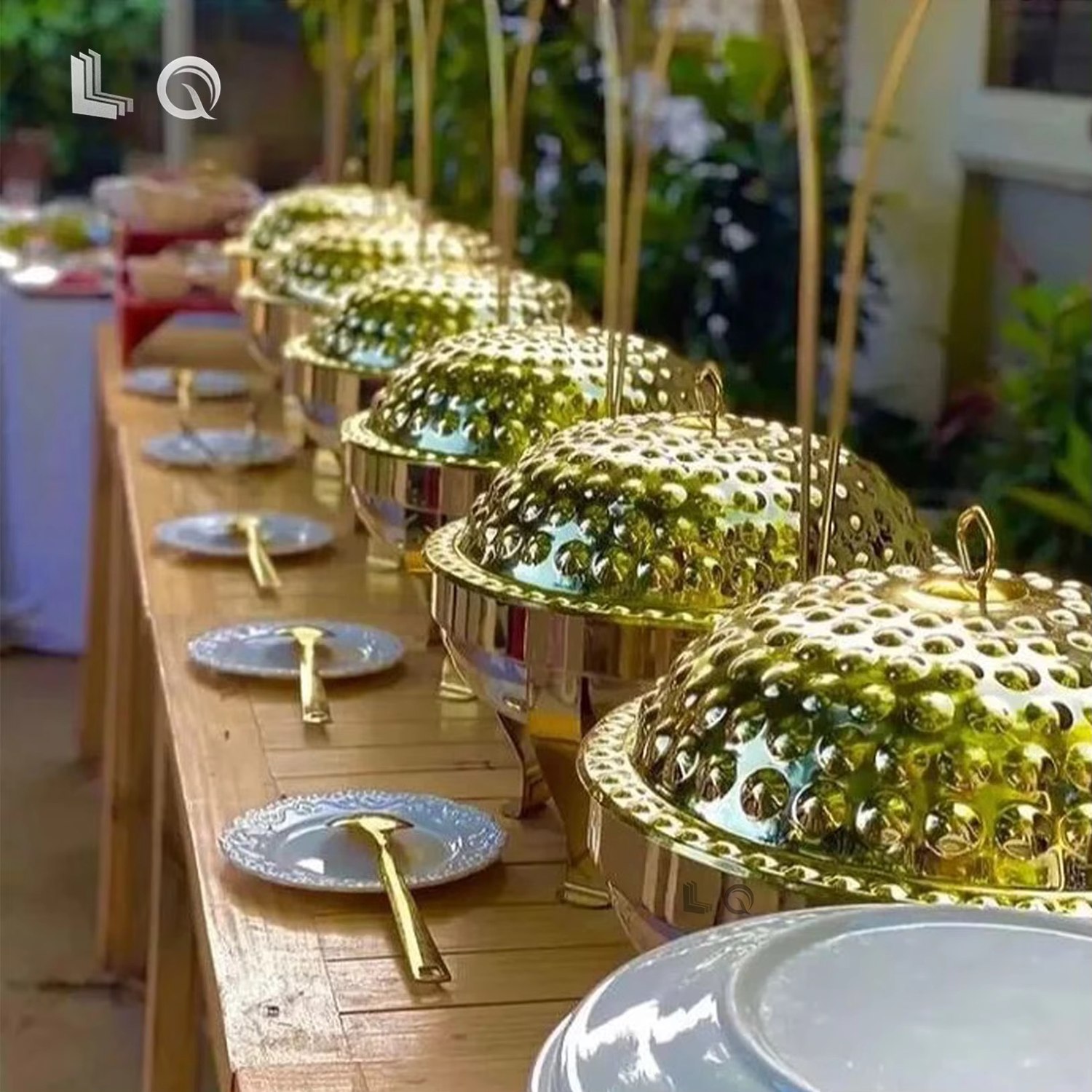 Gold buffet dishes at an event