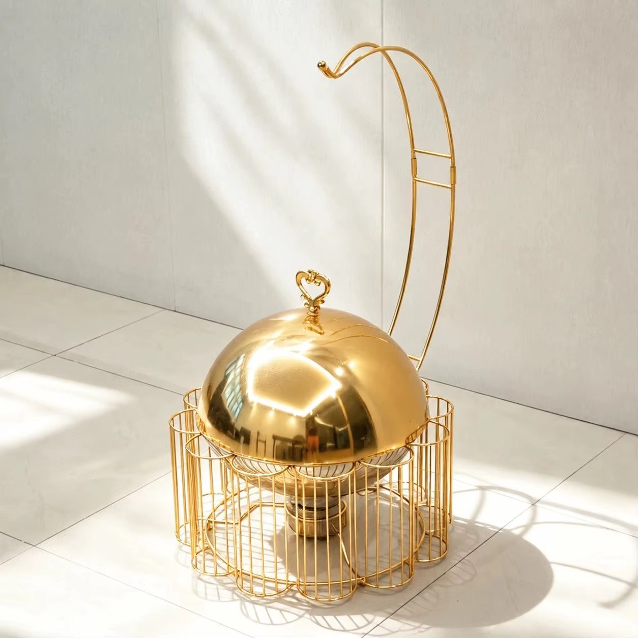 Gold buffet serving dish with lowered dome